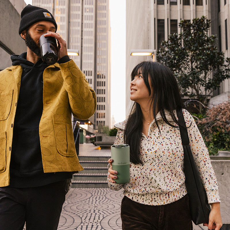 bring-your-own-party-kit-pints-and-tumblers-t5 16oz_rise_tumbler_black_iceberg_couple_drink_city_street_square.jpg