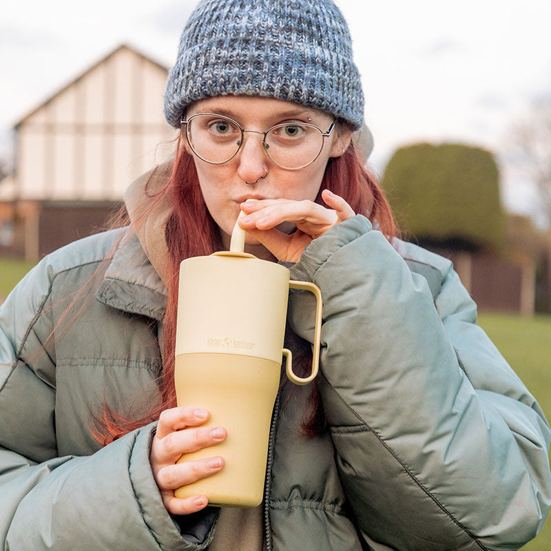 26oz-rise-tumbler-with-straw-lid-f5 26oz_rise_rumbler_straw_wax_yellow_woman_sip_square.jpg