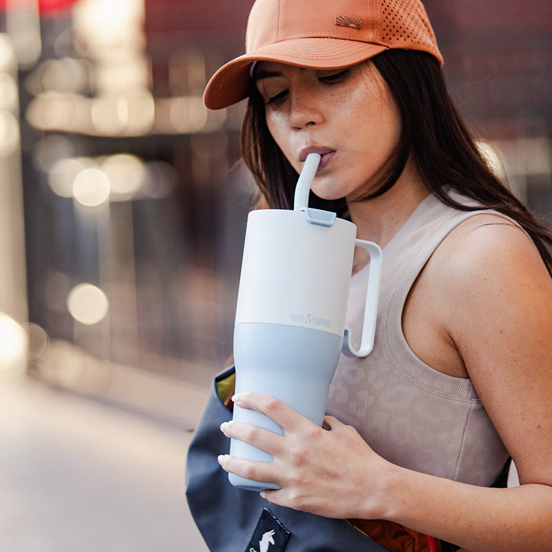 36oz-rise-tumbler-with-straw-lid-m7 36oz_rise_tumbler_straw_girl_sip_square.jpg