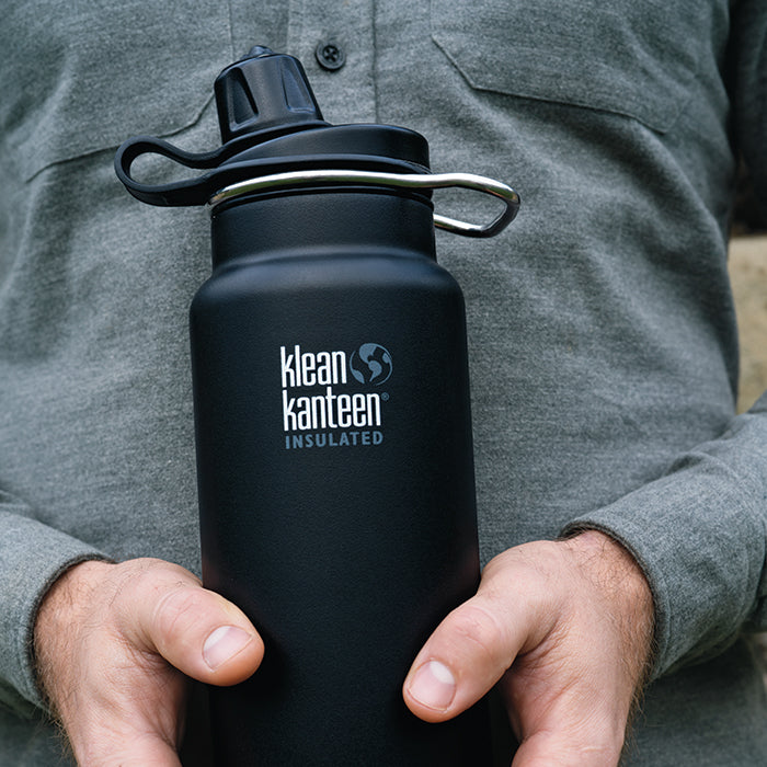 tkwide-chug-cap-h7 K32TKWSSL-SB-Craddled-Bottle_closeup_lifestyle.jpg