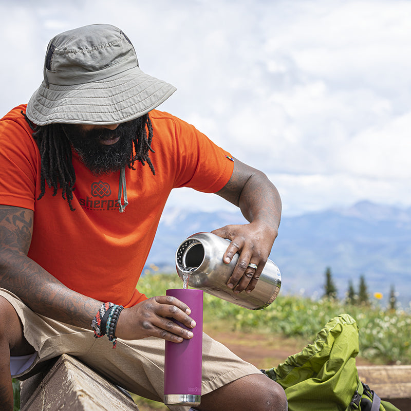 64oz-tkwide-with-loop-cap-q0 tkwide_64oz_bottle_backpacker_mountains_filling_square.jpg