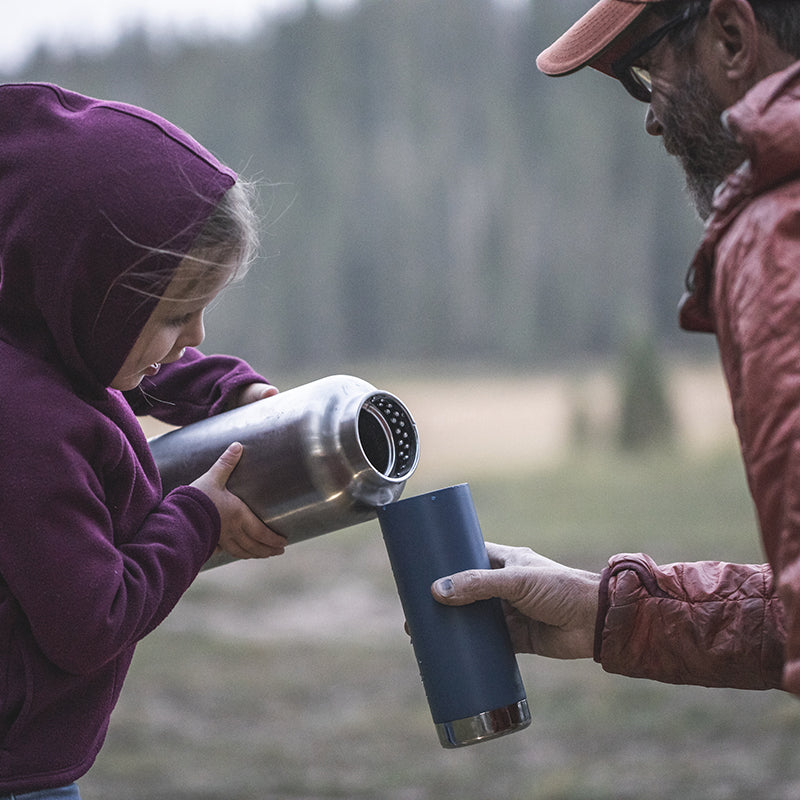 64oz-tkwide-with-loop-cap-q0 tkwide_64oz_bottle_girl_dad_filling_square.jpg